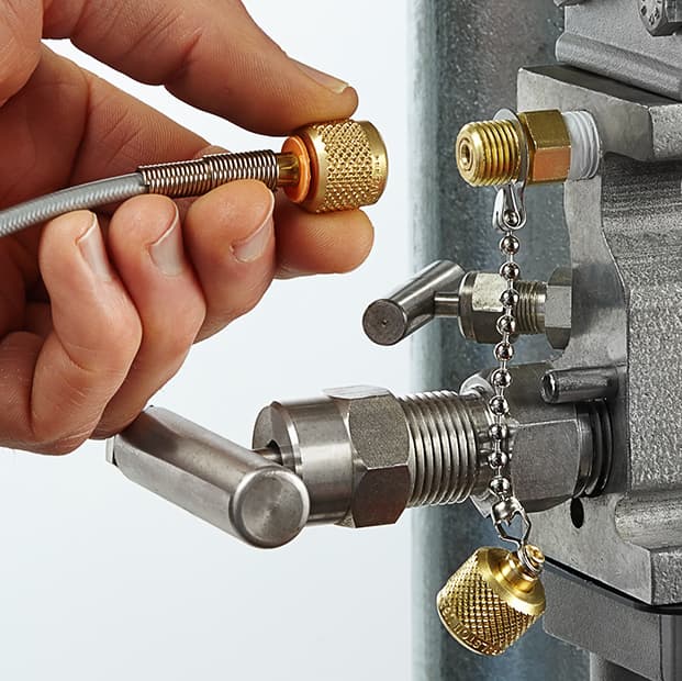 Ralston Quick-test™ hose connected to a device under test (DUT) for pressure testing